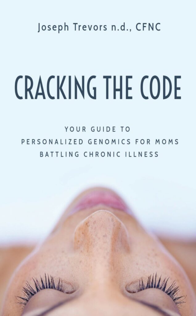 A picture of a book cover; 'Cracking The Code' by Joseph Trevors, n.d., CFNC. 'Your Guide To Personalized Genomics For Moms Battling Chronic Illness'. It also pictures a top-down view of a woman's face. Her nose freckled. Pictured as if taken horizontal, as if she is maybe laying face-up on a treatment bed.